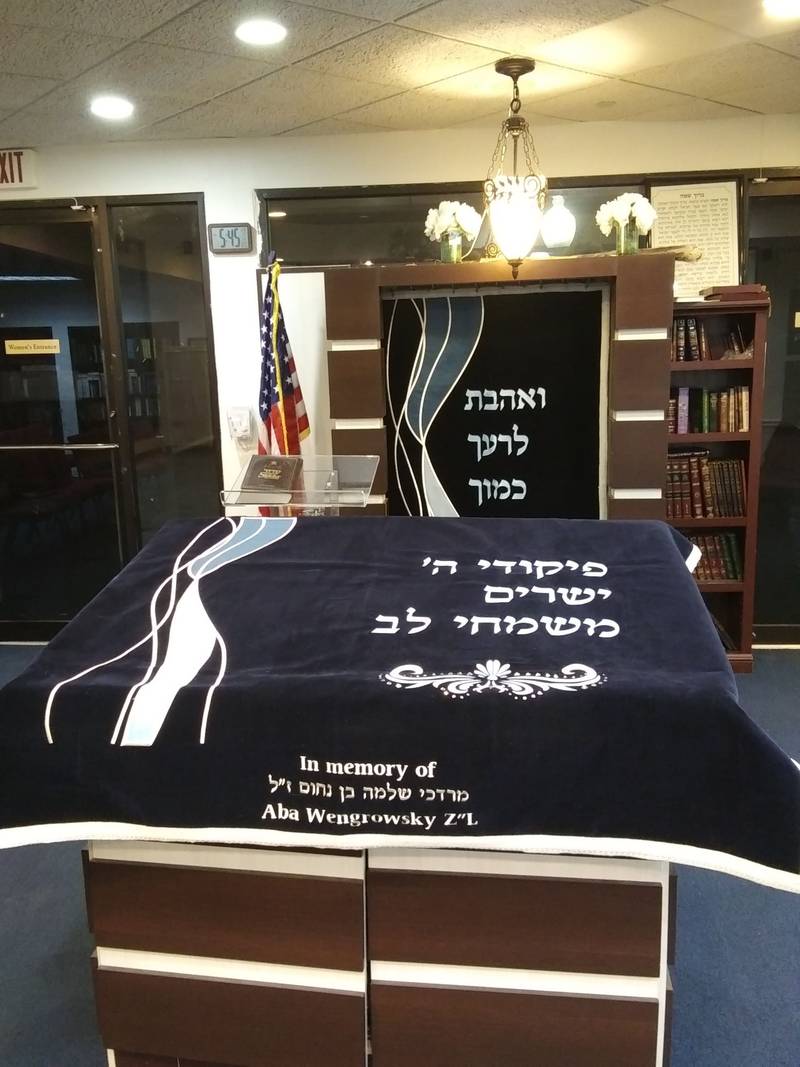 		                                		                                <span class="slider_title">
		                                    New Paroches and Bimah Cover		                                </span>
		                                		                                
		                                		                            	                            	
		                            <span class="slider_description">Donated by Jacobo Wengrowsky & family in memory of his father, Mordechai Shlomo ben Nachum</span>
		                            		                            		                            